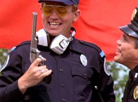 Cadent Eugene Tackleberry from the Police Academy and hig gun
